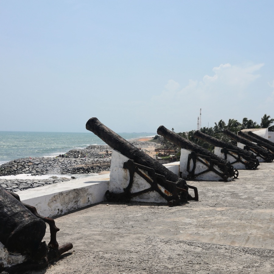 Cannons along the fort ramparts overlooking the Atlantic at Cape Coast